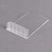 A clear plastic case with a white background holding white American Metalcraft mini chalk cards.