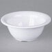 A white Carlisle melamine nappie bowl on a gray background.