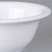 A close-up of a white Carlisle Sierrus melamine nappie bowl.