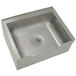A stainless steel Advance Tabco mop sink with a drain.