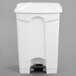 A white rectangular Lavex step-on trash can with a white lid.