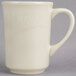 A Oneida Espree cream white china mug with a handle.