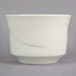 A white Oneida China bouillon cup with a swirly design.