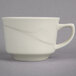 A white Oneida Espree china tea cup with a wavy design on the handle.