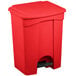 A red Lavex rectangular step-on trash can.