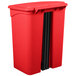 A red plastic Lavex rectangular step-on trash can with black handles and a lid.