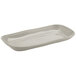 A white rectangular melamine platter with a rounded edge.
