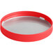 A red plastic spice lid with a metal rim.