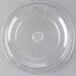 A clear plastic plate cover with a circular top and a hole in the middle.