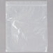A clear plastic bag with a zipper on a white surface
