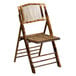 A Flash Furniture American Champion bamboo folding chair with a wooden seat.