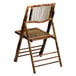 A Flash Furniture American Champion bamboo folding chair with a wooden seat and backrest.