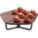 A Rosseto walnut melamine tray with fruit tarts on a table.