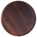 A round walnut melamine tray with a wood grain surface.