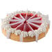A Pellman strawberries 'n cream cheesecake with white frosting and red jelly swirls on top.