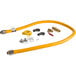 A yellow Regency gas connector hose kit with metal fittings and hoses.
