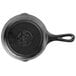 A Lodge black cast iron grill pan with a handle.