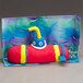 A red, yellow, and blue plasticine submarine.