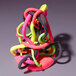 A colorful plasticine sculpture of rings.