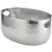 An American Metalcraft silver aluminum oval beverage tub with hammered texture and handles.