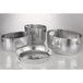 A group of American Metalcraft silver hammered aluminum beverage tubs with handles.