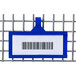 A close-up of a blue and white plastic label holder with a bar code.