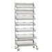 A Metro qwikSIGHT wire basket rack on wheels with seven shelves.