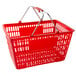 A red plastic shopping basket with handles.