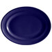 A cobalt blue oval platter with a white center and rim.