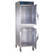 An Alto-Shaam stainless steel holding / proofing cabinet with two window doors.