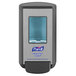 A close-up of a Purell Healthy Soap manual soap dispenser with a clear window and a black frame.