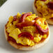 Two egg muffins with Del Sol sliced cherry peppers on top.