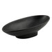 A black G.E.T. Enterprises Bugambilia oval bowl.