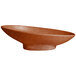 A brown G.E.T. Enterprises Bugambilia terracotta oval bowl with a textured rim.