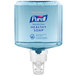 A close-up of a clear plastic Purell Healthy Soap bottle with a pump.