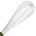 A Matfer Bourgeat stainless steel wire whisk with a yellow and black Exoglass handle.