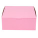 A pink rectangular bakery box with a white lid.