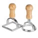 A pair of Fox Run ravioli cutters with metal and wooden handles.