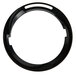 A black circular adjustment ring with a hole in the middle.