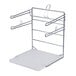 A chrome metal rack with white surfaces for t-shirt bags.