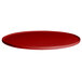 A G.E.T. Enterprises Bugambilia red resin-coated aluminum round disc with rim on a table.