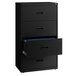 A black Hirsh Industries lateral file cabinet with four drawers, one open with blue paper inside.
