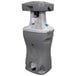 A grey and white PolyJohn Bravo 22 portable dual hand washing station with a lid.
