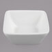 A white square G.E.T. Enterprises Bugambilia metal bowl with a textured finish.