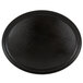 A black Carlisle oval non skid fiberglass serving tray.