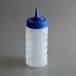 A clear plastic Vollrath squeeze bottle with a blue cap.