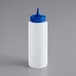 A white plastic squeeze bottle with a blue lid.