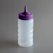 A plastic bottle with a purple lid.