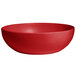 A cranberry red G.E.T. Enterprises Bugambilia deep round bowl with a smooth finish.