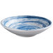 An Elite Global Solutions Van Gogh navy melamine bowl with a blue and white swirl design.